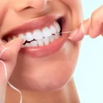 Cómo usar el hilo dental correctamente